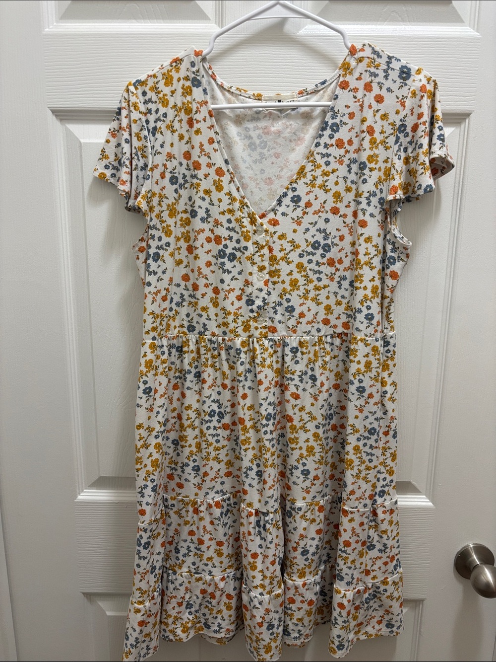 Derek Heart White Floral V‑Neck Tiered Midi Dress with Orange & Yellow Blossoms